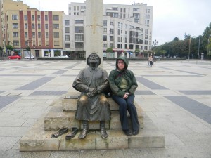 Sharon keeping St. Martin company in front of the parador (hotel) in Leon, Spain