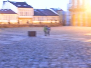 Early morning when we were about to leave, two pilgrims arrived.  I photographed them as I was getting on the bus.  This is the square with the cathedral right in front of them.  Blurry but I had to get it!